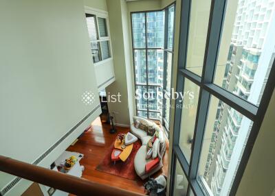 Modern high-rise living room with large windows