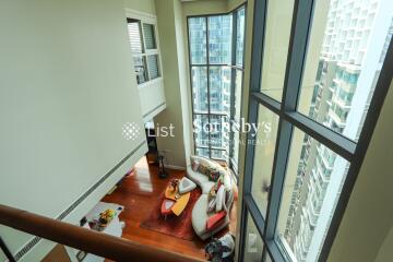 Modern high-rise living room with large windows