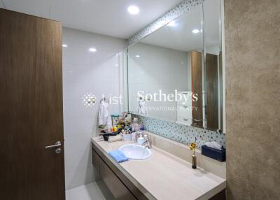 Modern bathroom with large mirror