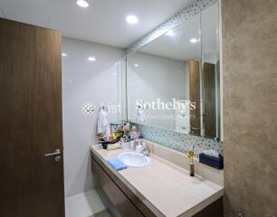 Modern bathroom with large mirror