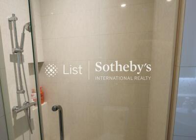 Shower area in a bathroom with a transparent glass door