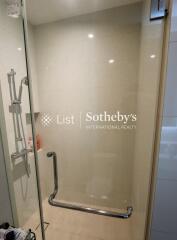 Shower area in a bathroom with a transparent glass door