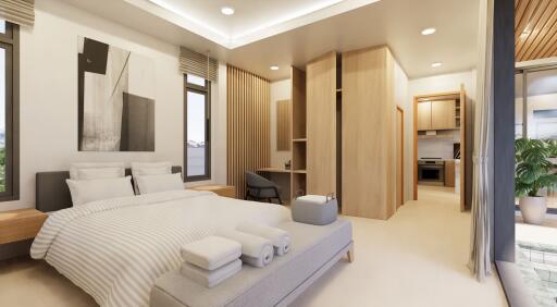 Modern bedroom with ensuite bathroom and study area