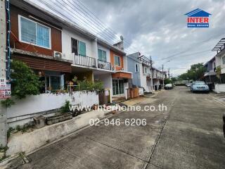 Street view of residential neighborhood with row houses