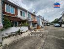 Street view of residential neighborhood with row houses