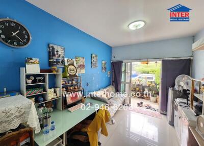 Bright living room with blue accent wall and modern decor