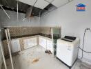 Home kitchen with appliances and tile backsplash