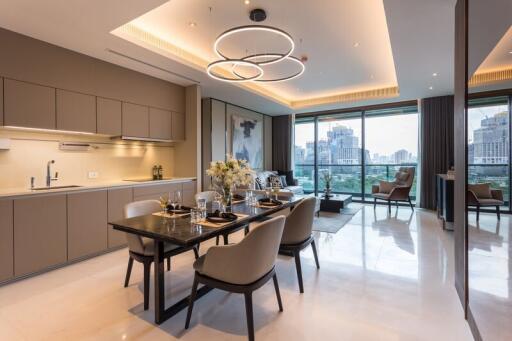 Modern open-plan kitchen and dining area with city view