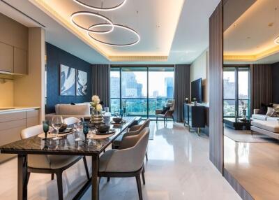 Modern living and dining area with a city view