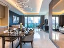 Modern living and dining area with a city view