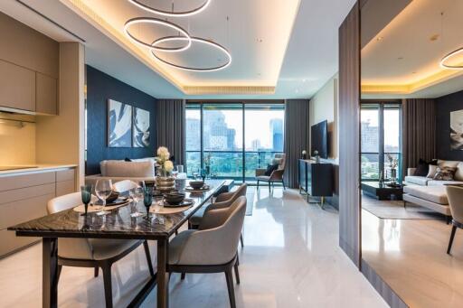 Modern living and dining area with a city view