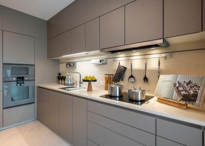 Modern kitchen with built-in appliances and minimalist design