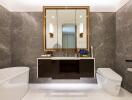 Modern bathroom with marble walls and sleek fixtures