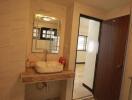 Modern bathroom with sink and large mirror