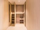 Spacious storage closet with ample shelving and cabinetry