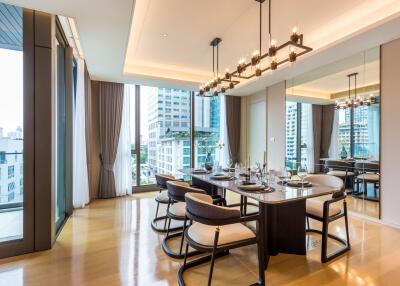 Modern dining room with large windows and city view