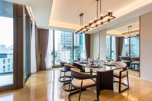 Modern dining room with large windows and city view