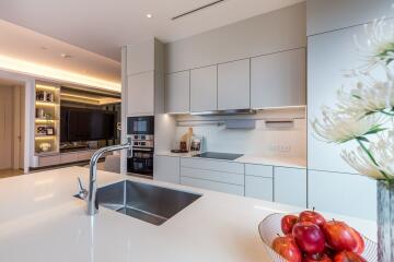 Modern kitchen with island and built-in appliances