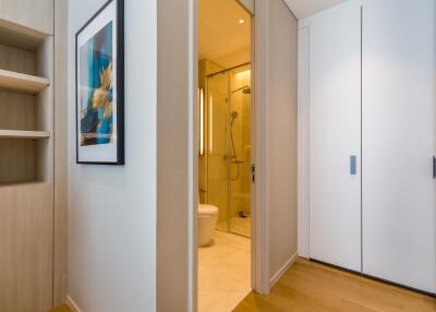 A modern bathroom with a view from the hallway