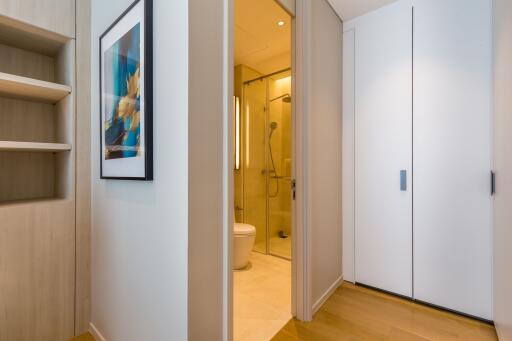 A modern bathroom with a view from the hallway