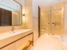 Modern bathroom with large mirror and glass shower