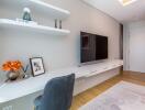 Modern living room with wall-mounted TV and stylish decor