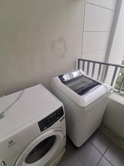 Laundry area with washing machine and dryer