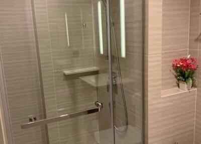 Modern bathroom with glass shower enclosure