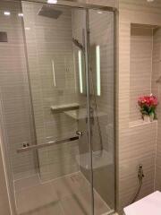 Modern bathroom with glass shower enclosure