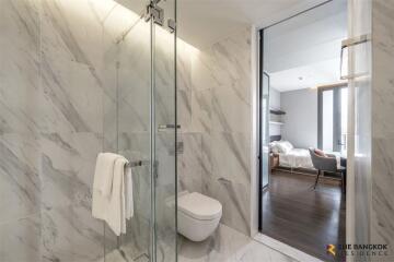 Modern bathroom with glass-enclosed shower