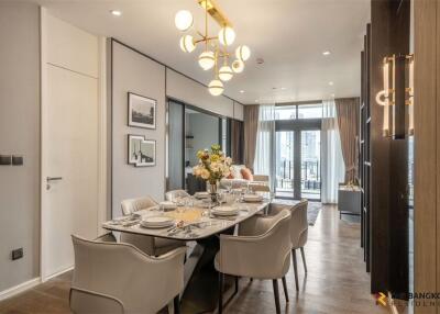 Modern dining room with elegant lighting and contemporary decor