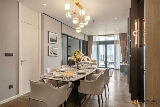 Modern dining room with elegant lighting and contemporary decor