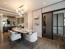 Modern dining room with elegant table setup and contemporary lighting.