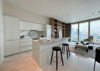 Modern kitchen and living area with city view