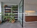 Modern kitchen with indoor plant wall