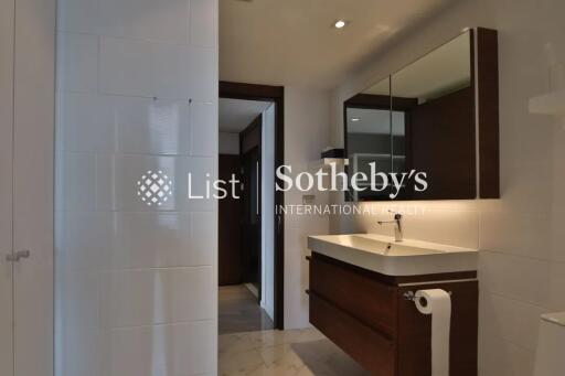 Modern bathroom with vanity and large mirror