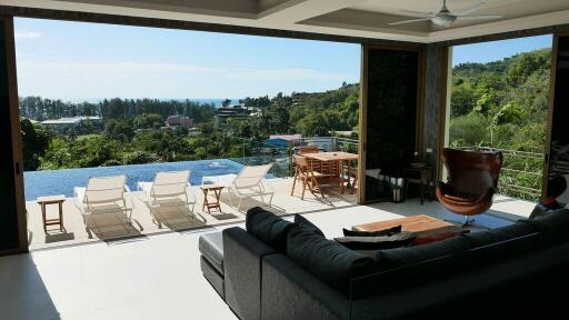 Modern living area with poolside view