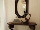 Elegant hallway with decorative table and mirror