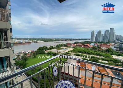 Balcony view overlooking river and cityscape