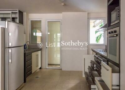 Modern kitchen with stainless steel appliances and ample storage space