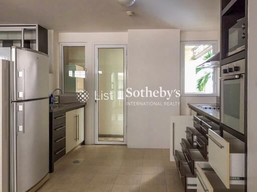 Modern kitchen with stainless steel appliances and ample storage space