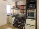 Modern kitchen area with appliances and storage