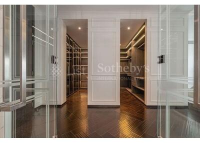 Spacious walk-in closet with built-in storage solutions