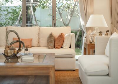 Modern living room with natural light and garden view