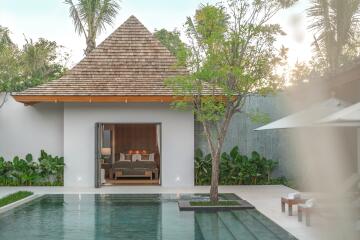 Luxurious bedroom with poolside view