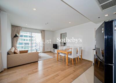 Living room with adjacent dining area