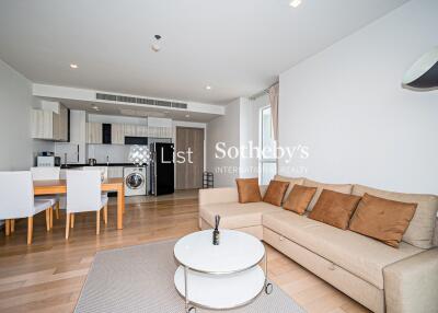 Modern living room with kitchen and dining area