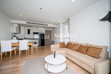 Modern living room with kitchen and dining area