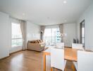 Bright and modern living room with dining area