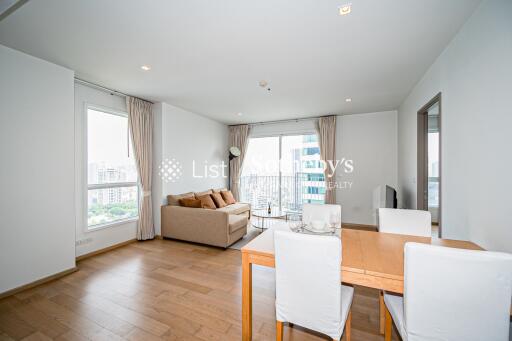 Bright and modern living room with dining area